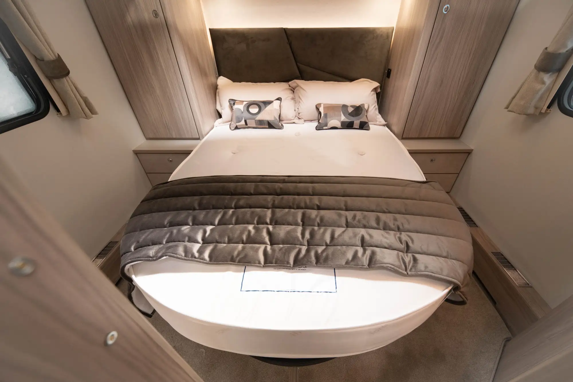 a luxurious caravan interior (bed)